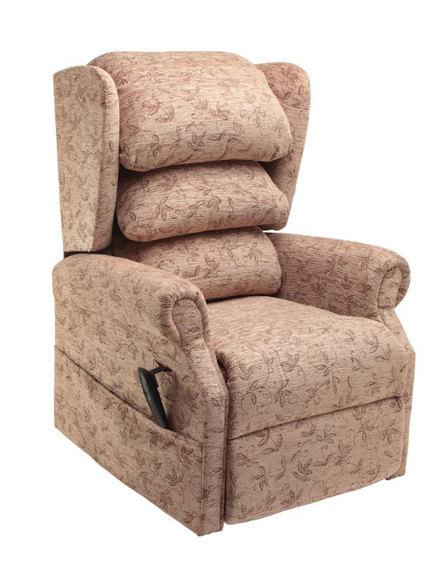 Here we have the All Terrain Mobility Tilt In Space Rise & recline chair in spray - this is comfortable arm chair-style rise & recline chair with a waterfall back, electric hand control in a beige fabric with a leafy pattern.